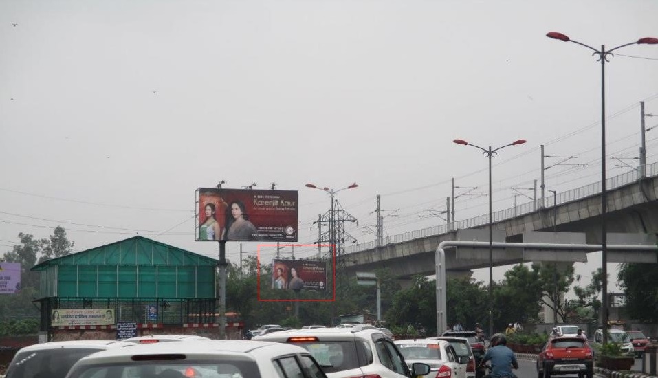 Hoarding Advertising on Punjabi Bagh, Ring Road Towards Raja Garden