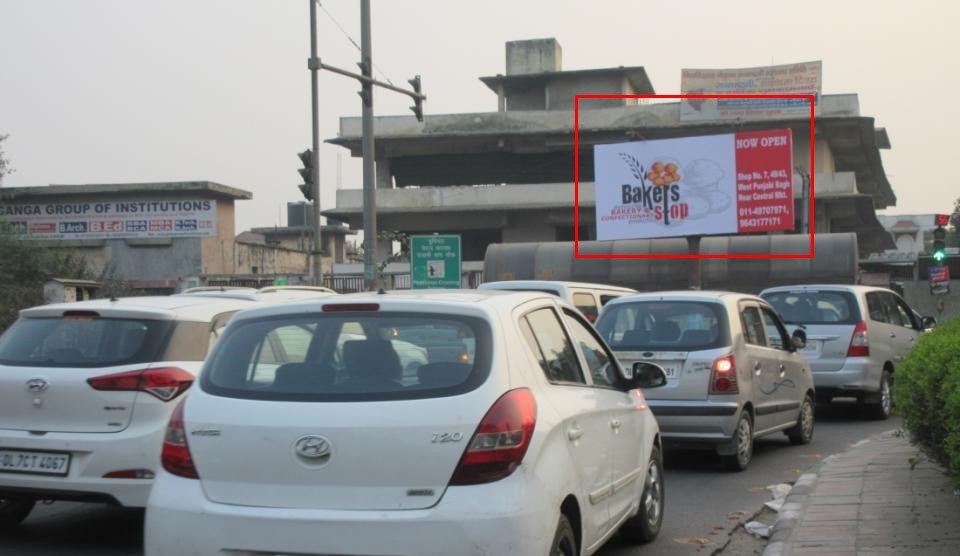 Hoarding Advertising On Punjabi Bagh (Ring Road), Traffic Coming From Netaji Subhash Place Towards Dhaula Kuna/ Moti Bagh