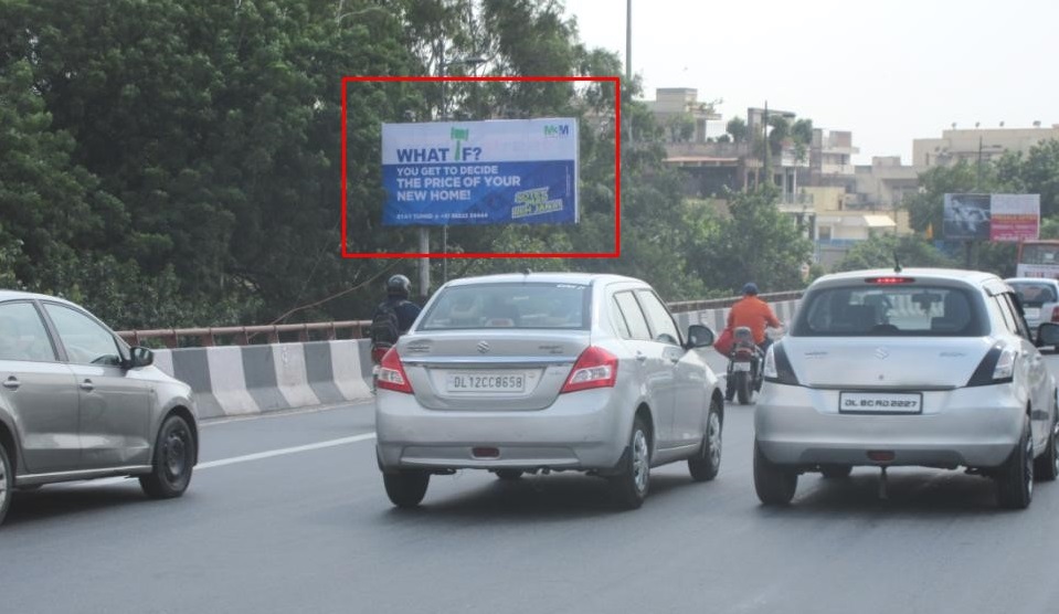 Hoarding Advertising Beside Milan Cinema, Traffic Coming From Sanatan Mandir Going Towards Najafgarh Road 